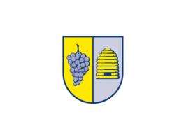 Das Bild zeigt ein Wappen mit einer gelben Traube auf der linken Seite und einem gelben Bienenkorb auf der rechten Seite.